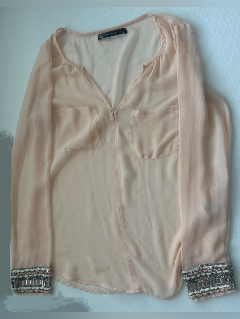 Zara women’s Blush Peach Beaded Cuff Long-Sleeve Blouse. Size S.
